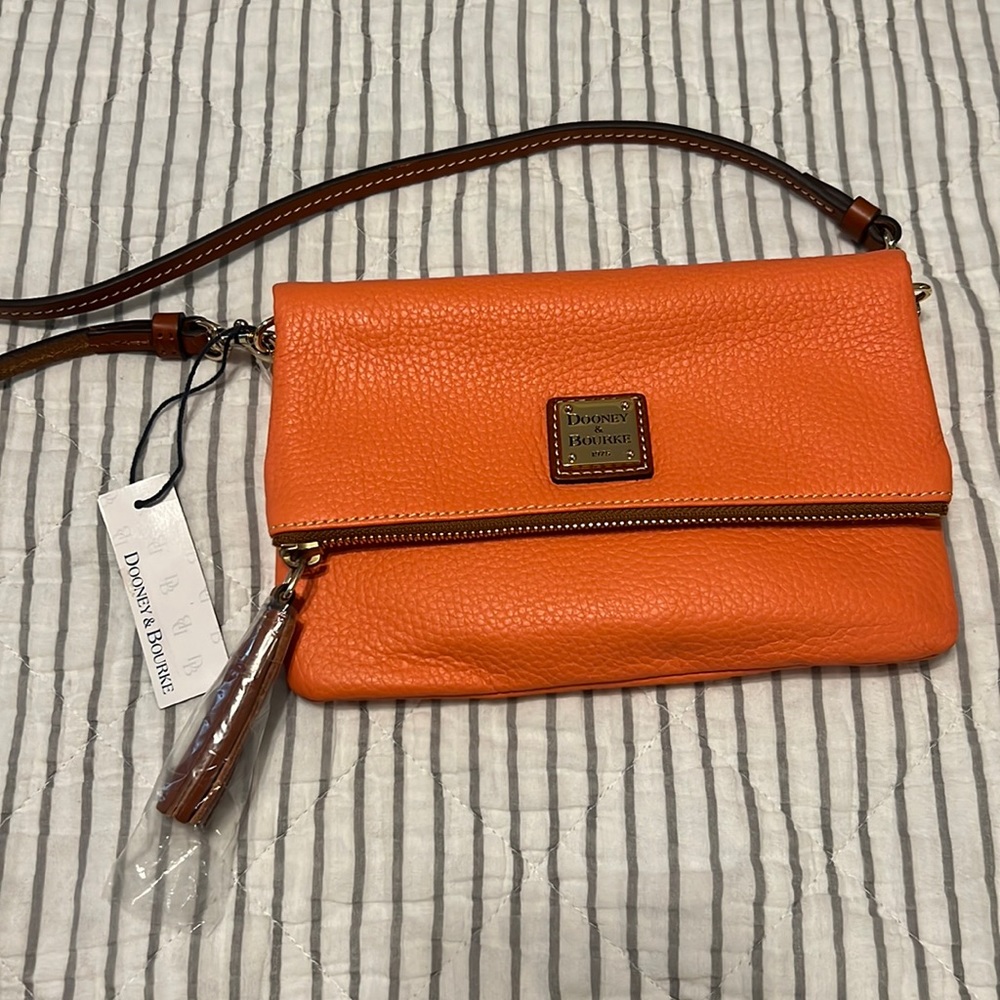 Dooney and Bourke flap over cross body bag.